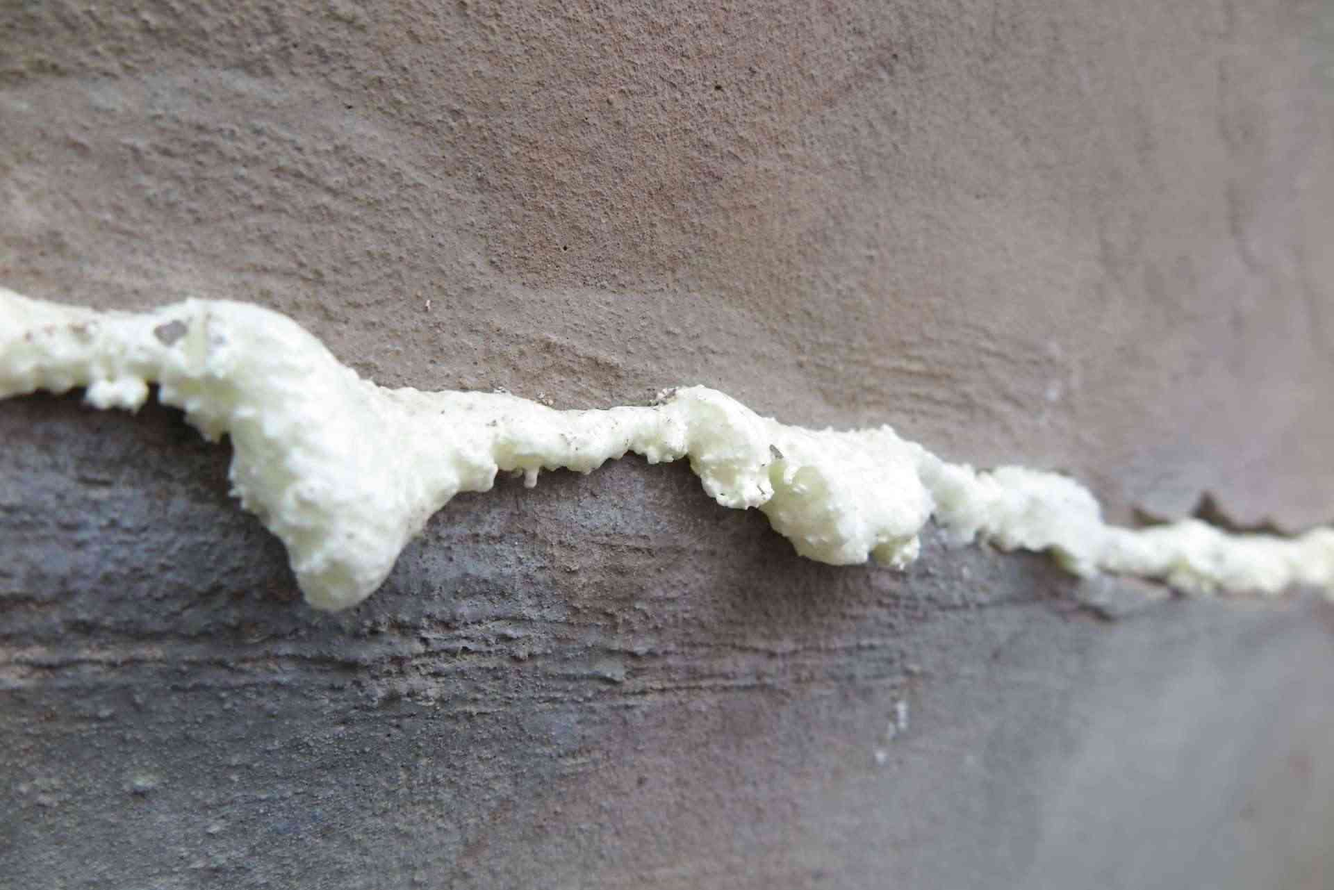 Polyurethane Foam Is Being Injected Under a Concrete Slab for Leveling and Lifting in Calgary, AB<br />
