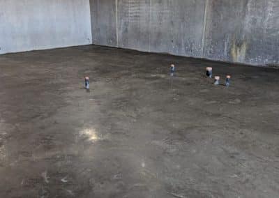 Smooth Concrete Finish Applied to the Basement Floor in Calgary, AB
