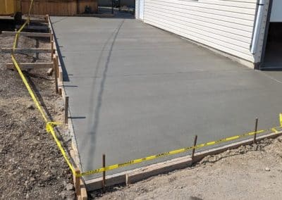 Durable Broom Finish Applied to Concrete Parking Pad in Calgary, AB