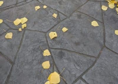 Concrete Surface with Slate Stamped Finish Mimicking Natural Stone Texture in Calgary, AB
